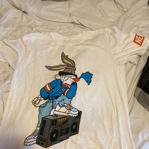 Medium white tshirt with BugsBunny on both ends. It is NEFF brandedxLooney Toons